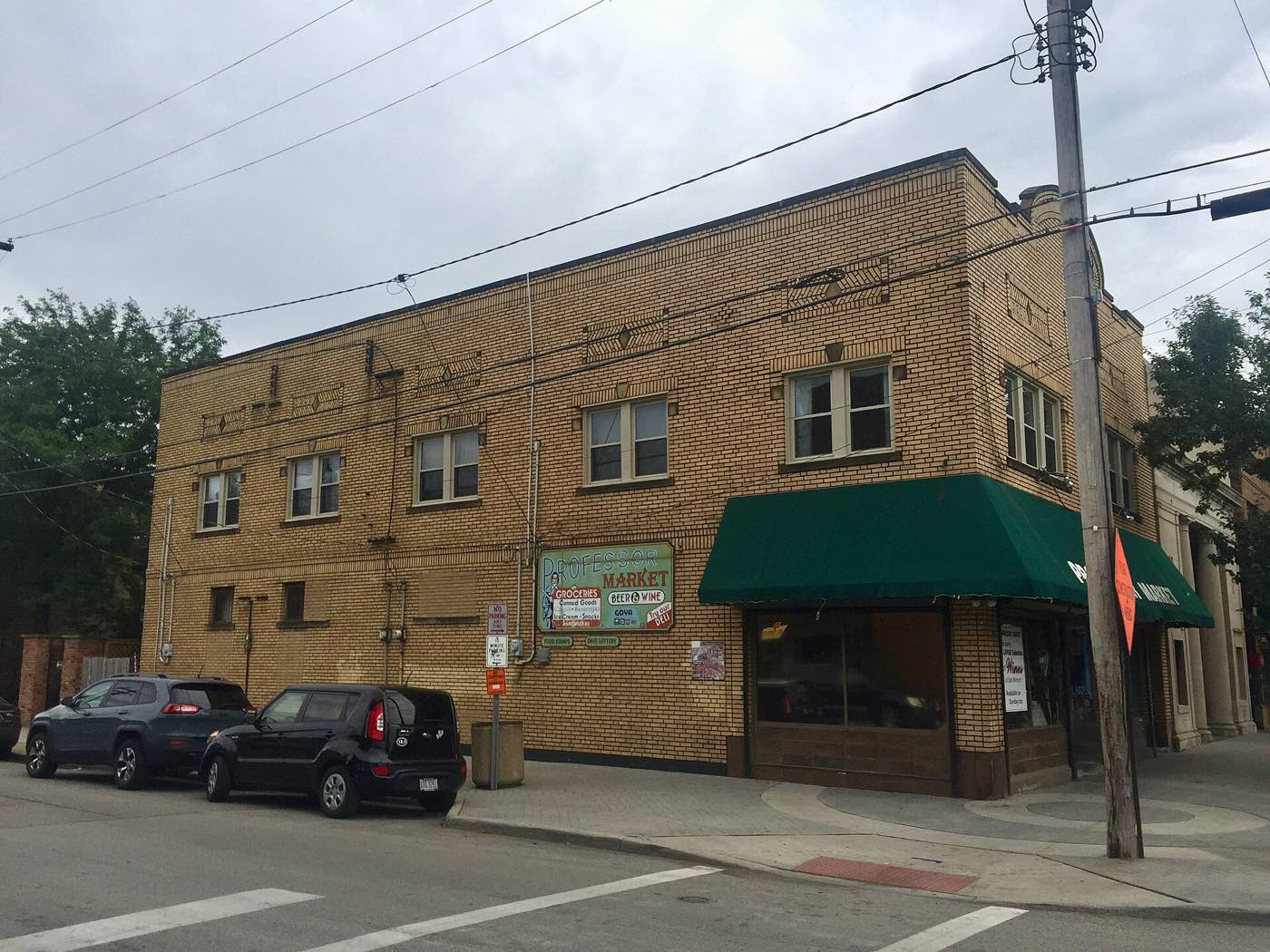 Professor Avenue in Tremont, mile 10. Brick, porches, and the loudest four blocks of the first half.